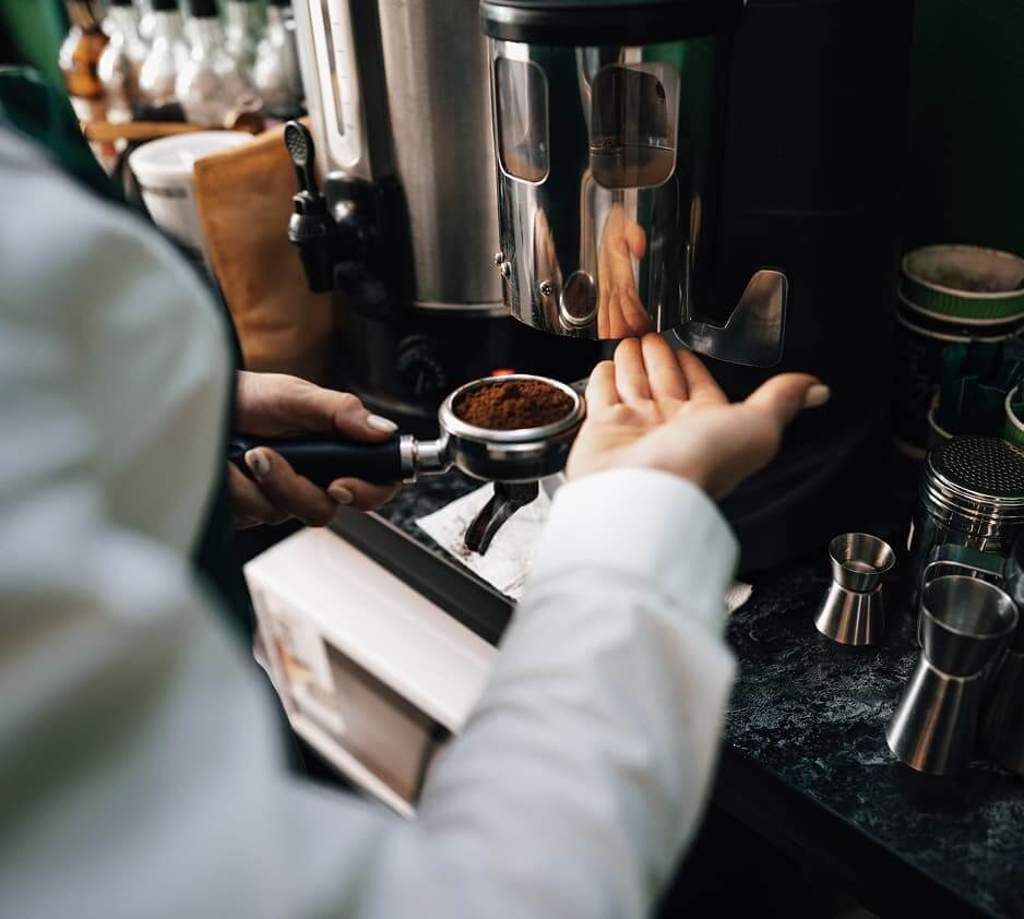 Barista making coffee