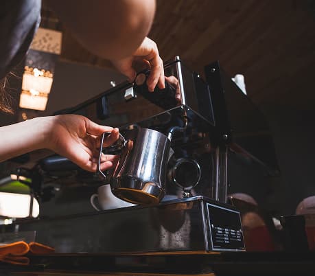 Barista making coffee