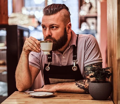 A man drinking coffee
