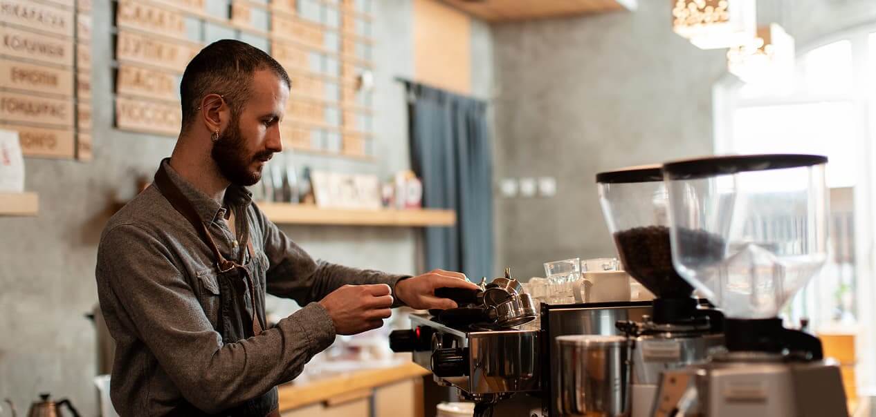 Barista making coffee