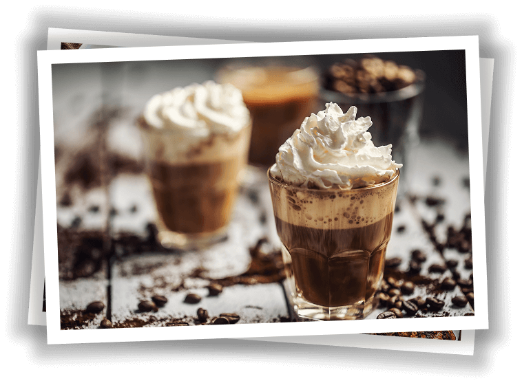 2 hot drinks topped with whipped cream